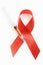 AIDS red ribbon symbol and syringe