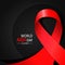 AIDS word day. 1st December the day of the AIDS awareness. Red silky ribbon.