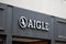 Aigle logo brand and sign text front facade entrance store boots shoes shop footwear