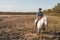 Aigues-Mortes, Camargue, Southern France, September 19, 2018. The Cowboys, riding on beautiful white horses, greeting tourists who