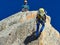 AIGUILLE DU MIDI, FRANCE - AUGUST 8, 2017: Alpinists climbing on rocks at Aiguille du Midi, Chamonix, France