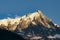 Aiguille du Midi in the light of the setting sun. Alps.