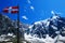 Aiguille du midi mountain and flying flag seen from Plan de l`Aiguille, French Alps