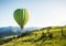 Air ballon above mountains at the summer time.