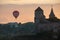 Air balloon flies close to walls of medieval Castle Kamianets-Podilskyi