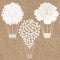 Air balloon-flowers. Monochrome vector illustration of three different variants on kraft paper.  Sketch, isolated elements