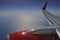 Air Berlin Wing with Flight Turbine above Clouds