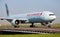 Air Canada Boeing 777-300ER C-FIVS passenger plane arrival and landing at Paris Charles de Gaulle Airport