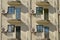 Air conditioners on the balconies.