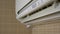 Air conditioning in the house to adjust the temperature in the room. Air conditioning works. Close-up.