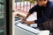 Air conditioning technicians install new air conditioner, Technician service for repair and maintenance of air conditioners