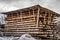 Air drying and seasoning wooden planks in large timber stack