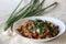 Air fried cottage cheese cubes and baby corn prepared with chilli sauce. It is an Indo Chinese dish, locally known as chilly