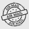 Air-mail rubber stamp isolated on white.