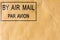 Air mail stamp on envelope