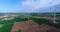 Air panoramas of agricultural fields and wind generators producing electricity. Modern technologies for obtaining