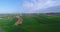 Air panoramas of agricultural fields and wind generators producing electricity. Modern technologies for obtaining