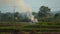 Air pollution concept, fire burn grass in rice field agriculture in countryside, flame and smoke floating to air