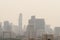 Air pollution effect made low visibility cityscape with haze and fog from dust in the air during sunset in Bangkok, Thailand