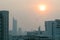 Air pollution effect made low visibility cityscape with haze and fog from dust in the air during sunset in Bangkok, Thailand