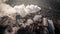 Air pollution by smoke coming out of two factory chimneys. Aerial view