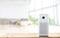 Air purifier a living room,  air cleaner removing fine dust in house. protect PM 2.5 dust and air pollution concept