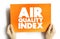 Air Quality Index - used by government agencies to communicate to the public how polluted the air, text concept on card for