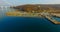 Air review of the coastline of the Russian island with a pier and ships