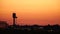 Air traffic control tower in sunset