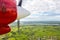 Air travel in Fiji, Melanesia, Oceania. View of Rewa river, Nausori town, Viti Levu island from a window of a small airplane.