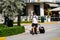 Airbnb tourists walking in Miami Beach with luggage suit cases