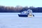 The airboat of the rescue service rides on the ice of a frozen river, patrols the lake in winter. Special vehicle, emergency