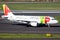 Airbus A319 airplane from TAP Air Portugal airlines taxiing to the gate after landing on Dusseldorf airport. Germany - February 7