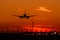 Airbus A320 airplane silhouette at sunset , final approach