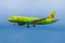 Airbus a320 S7 Airlines on the background of storm clouds