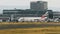 Airbus A380 of Emirates airlines rides past terminal