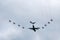 Airbus A400 in formation with Red Arrows (Hawks T1)