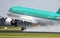 Airbus taking off on wet runway