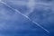 Aircraft contrails on a blue sky