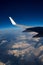 Aircraft flying over snowed mountains of Pyrenees