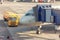 Aircraft in the parking lot is attached to the boarding bridge for boarding passengers from terminal building, truck with fuel