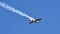 Aircraft performs amazing aerobatics flips releasing aerobatics smoke from behind