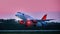 Aircraft Sukhoi Superjet 100 RA-89136 Azimut airlines takes off in airport Platov. takeoff against the sunset sky. Spotting at the