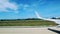 Aircraft taking off. Aruba. Caribbean. Blue sky and white clouds.