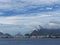 An Aircraft taking off from Santos Dumont Airport in front of Copacabana Beach, and the Christ the Redeemer Statue.