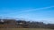 Aircraft Vapour Trail in the Shape of St Andrews Cross Against a Blue Sky