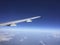 Aircraft Wing above Clouds