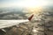 Aircraft wing on the clouds with top view Agricultural field , flying traveling background