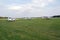 Aircrafts on a grass airfield