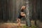 airedale terrier posing in the forest